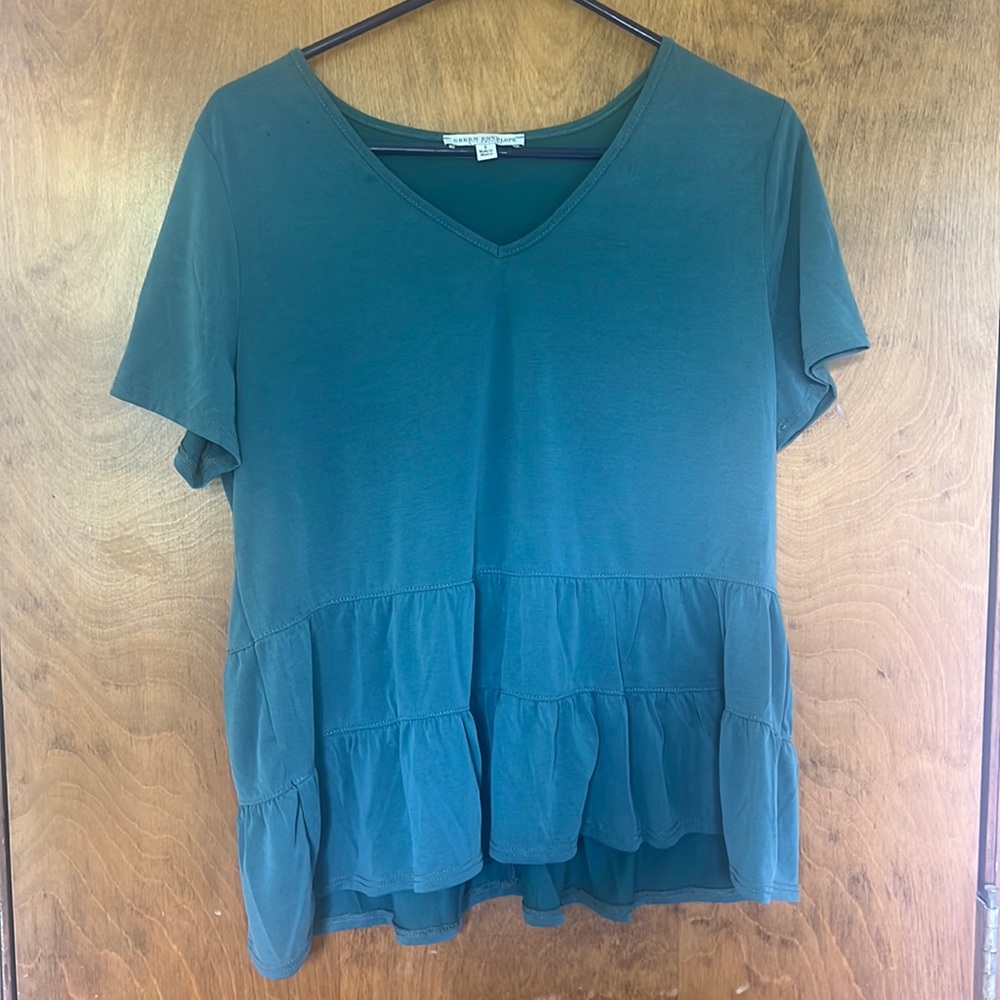 V-neck blouse with ruffles